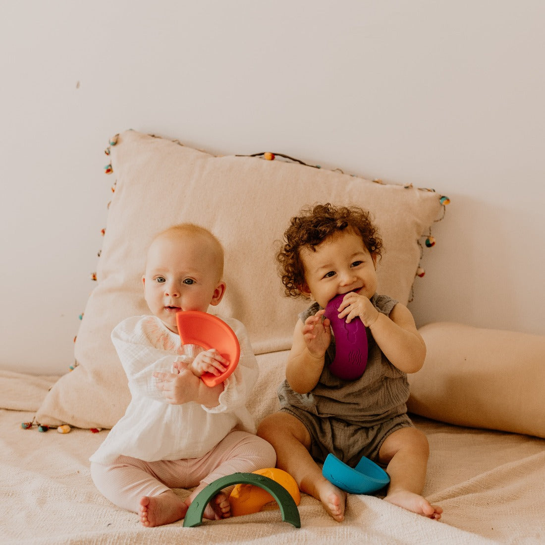 Two little bubs playing with the Over The Rainbow