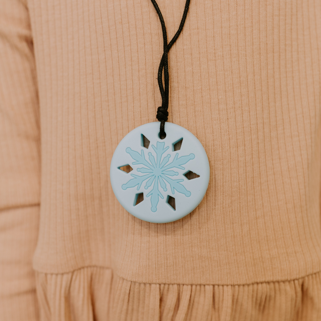 Close up of a snowflake pendant